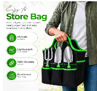 A person holds a black fabric gardening tool storage bag with bright green trim, containing several metal gardening tools. 